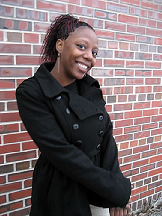 Young Woman Against Wall